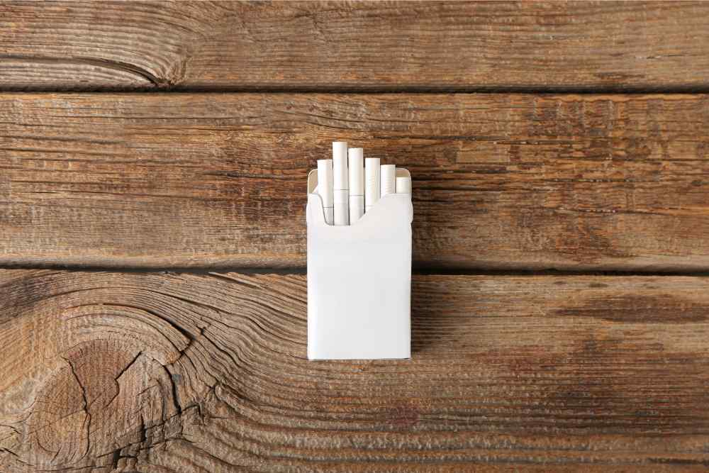 wooden background and d8 cigarettes