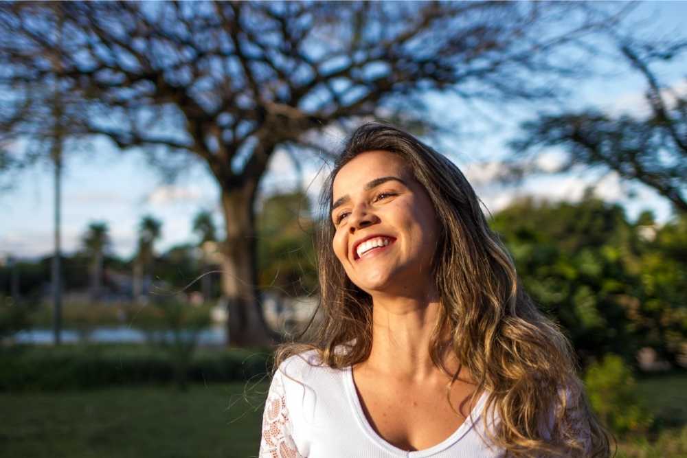 person smiling outside