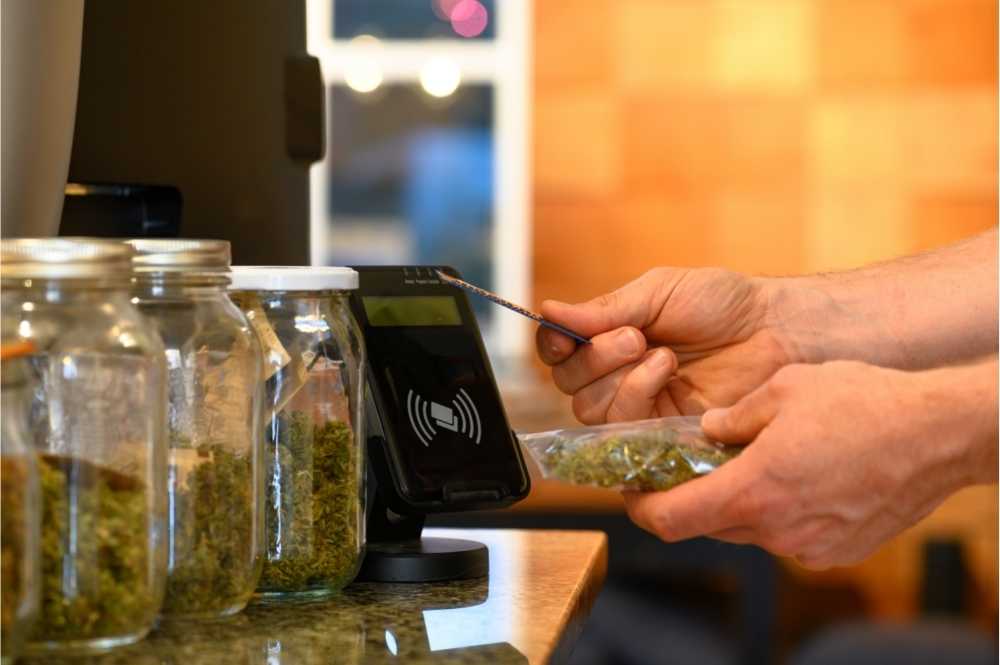 person purchasing products from a dispensary
