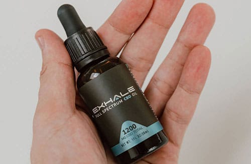 cbd oil in hand