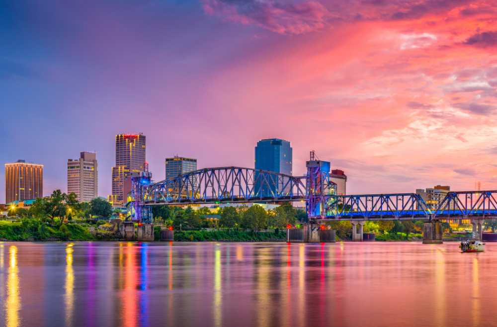 little rock arkansas skyline with pink purple sky